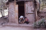  Little boy with old woman, Thailand or Laos (ca. 1970)