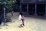 Children carrying children, northern Thailand or Laos (ca. 1970)