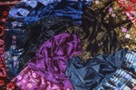  pinwheel of assorted embroidered silks (Thailand or Laos) 