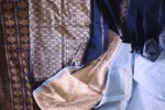  Blue silk embroidered with gold
