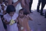  Children at temple with offerings