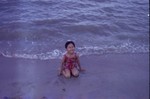  Thai child at beach near Nakorn Srithammarat