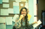 "Licking a Stamp"