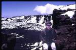 Kitty at very edge of Mauna Loa