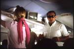 Looks like Maureen with her back to the camera. Who is the guy in dark glasses