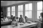Charles Berry  with students in cafeteria